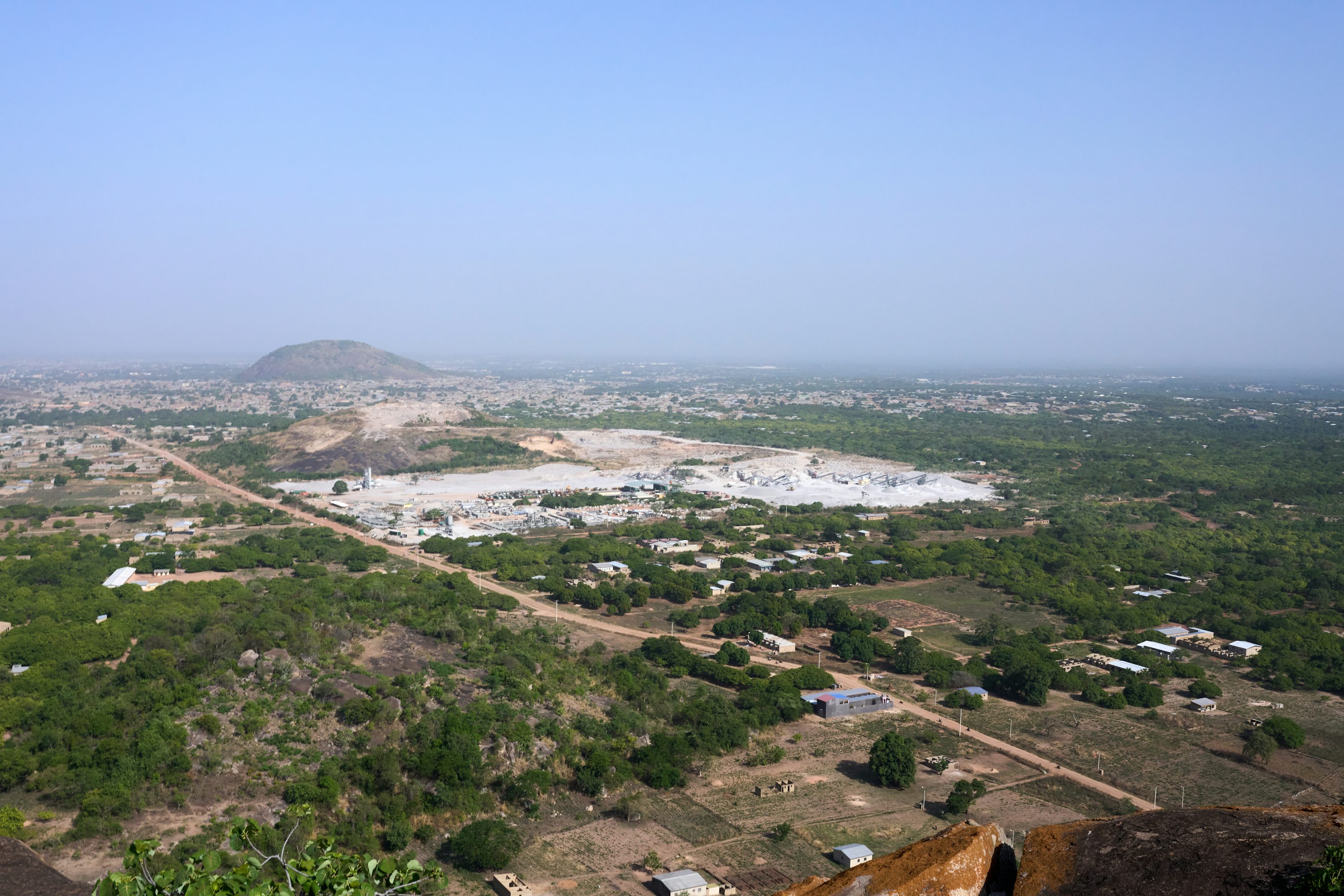 Wide quarry landscape representing dependable operational reach