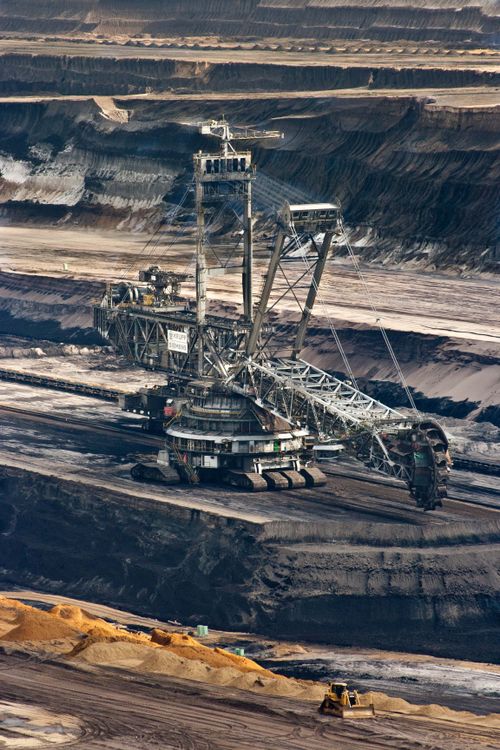 Heavy extraction machinery operating at a mine
